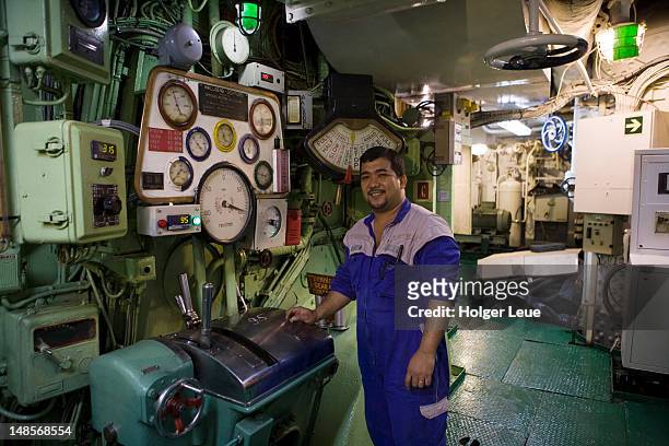 engineer in engine room of cruiseship mv princess daphne (international classic cruises) during north sea voyage. - princess cruises stock pictures, royalty-free photos & images