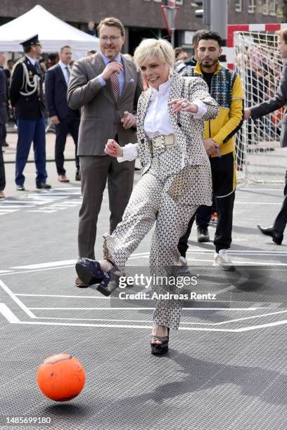 Princess Laurentien of The Netherlands plays football during Kingsday celebrations on April 27, 2023 in Rotterdam, Netherlands. King Willem-Alexander...