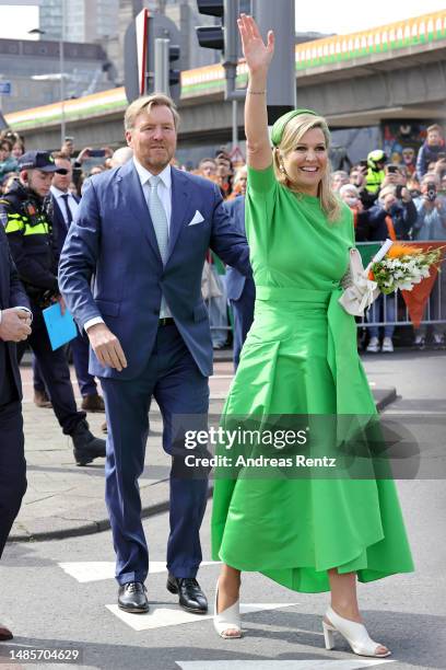 King Willem-Alexander of The Netherlands and Queen Maxima of The Netherlands wave to the public during Kingsday celebrations on April 27, 2023 in...