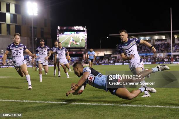 Ronaldo Mulitalo of the Sharks scores a try during the round nine NRL match between Cronulla Sharks and North Queensland Cowboys at PointsBet Stadium...
