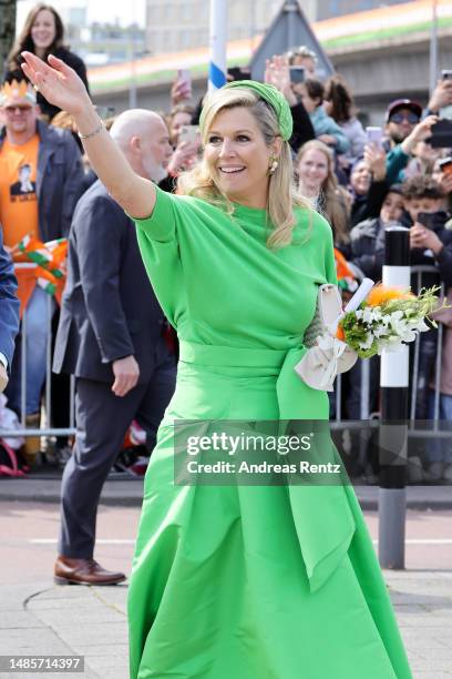 Queen Maxima of The Netherlands waves to the crowd during Kingsday celebrations on April 27, 2023 in Rotterdam, Netherlands. King Willem-Alexander...
