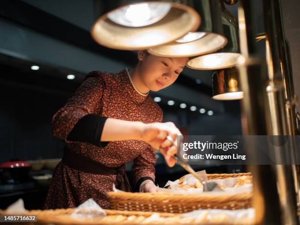 Sorting Bread Asian Making Bread Photos and Premium High Res Pictures - Getty Images