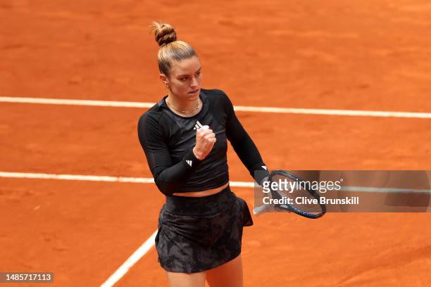 Maria Sakkari of Greece celebrates a point against Arantxa Rus of Netherlands during the Women's Singles Second Round on Day Four of the Mutua Madrid...