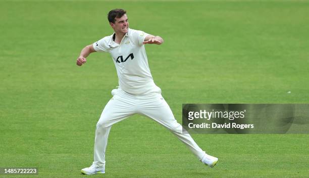Tom Lawes of Surrey celebrates after taking the wicket of Sam Hain during the LV= Insurance County Championship Division 1 match between Warwickshire...