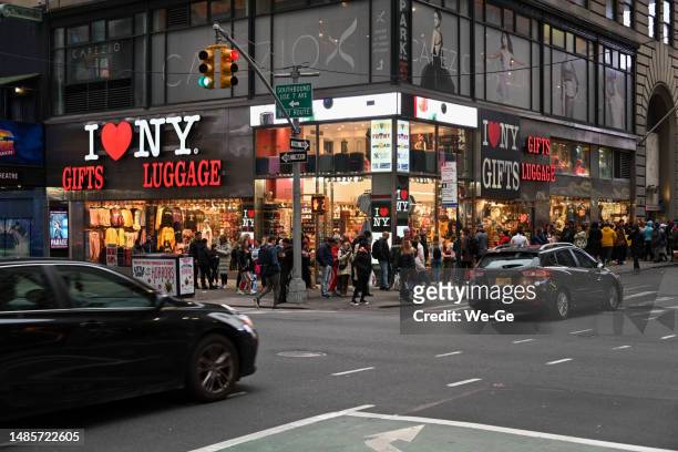 i love ny gifts luggage on seventh ave near time square, new york, north hudson, united states. - times square store stock pictures, royalty-free photos & images