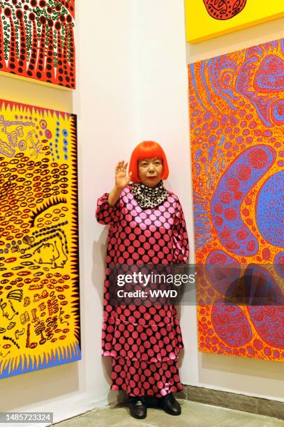 Japanese artist Yayoi Kusama at her Whitney Museum of American Art restrospective exhibit. Kusama wears Louis Vuitton.