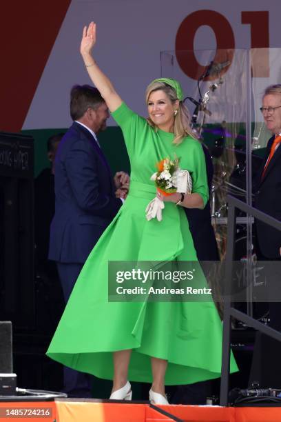 Queen Maxima of The Netherlands waves to the crowd during Kingsday celebrations on April 27, 2023 in Rotterdam, Netherlands. King Willem-Alexander...
