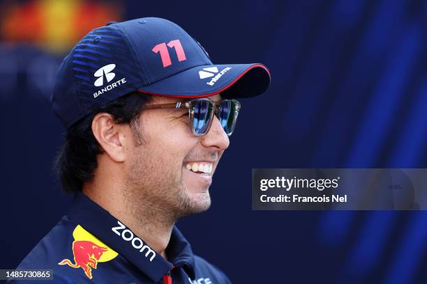 Sergio Perez of Mexico and Oracle Red Bull Racing talks to the media in the Paddock during previews ahead of the F1 Grand Prix of Azerbaijan at Baku...