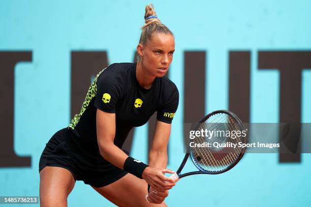 Arantxa Rus of Netherlands looks on against Maria Sakkari of Greece during the Women's Singles Second Round on Day Four of the Mutua Madrid Open at...