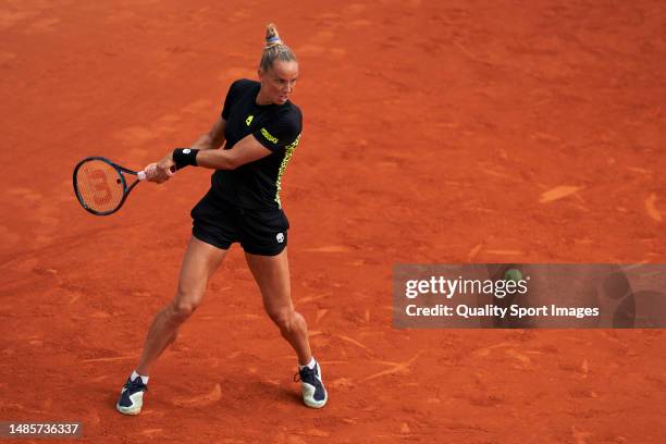 Arantxa Rus of Netherlands plays a forehand shot against Maria Sakkari of Greece during the Women's Singles Second Round on Day Four of the Mutua...