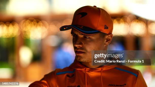 Lando Norris of Great Britain and McLaren looks on in the Paddock during previews ahead of the F1 Grand Prix of Azerbaijan at Baku City Circuit on...