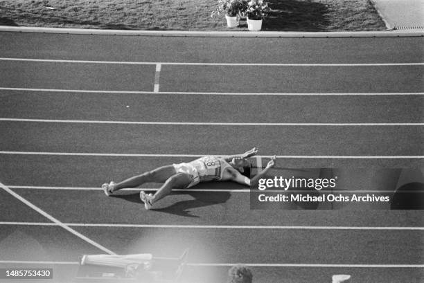 British athlete Steve Ovett after falling to the ground on finishing in fourth place in the first semifinal of the men's 800 metres event of the 1984...