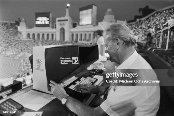 An operator sits at a terminal of AT&T's Electronic Messaging System during the 1984 Summer Olympics, at the Los Angeles Memorial Coliseum in Los...
