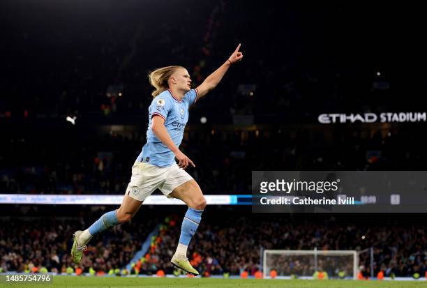 Erling Haaland of Manchester City celebrates scoring the teams fourth goal during the Premier League match between Manchester City and Arsenal FC at...