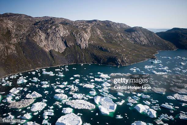 aerial of ice floes and icebergs of ilulissat kangerlua icefjord. - ilulissat stock pictures, royalty-free photos & images