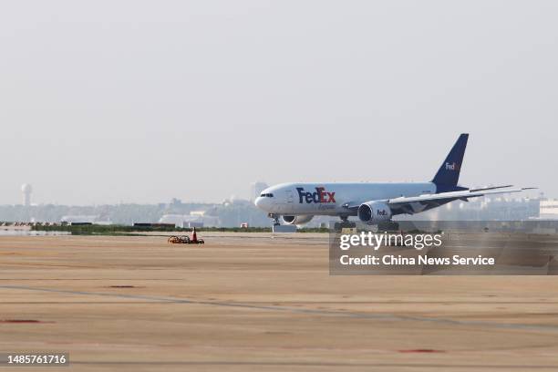 FedEx plane carrying Ya Ya, a female giant panda that has lived in the United States for two decades, lands at Shanghai Pudong International Airport...
