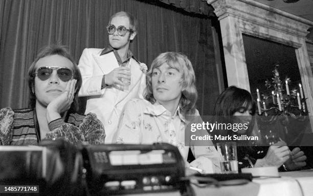 Songwriter Bernie Taupin, Musician/Singer/Songwriter Elton John, Musician/Singer Dee Murray and Musician Nigel Olsson during press conference to...