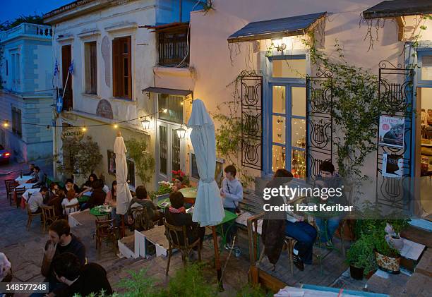 outdoor dining, plaka. - plaka stock pictures, royalty-free photos & images