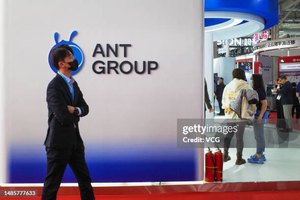 People visit the booth of Ant Group during China International Financial Exhibition at Shougang Park on April 25, 2023 in Beijing, China.