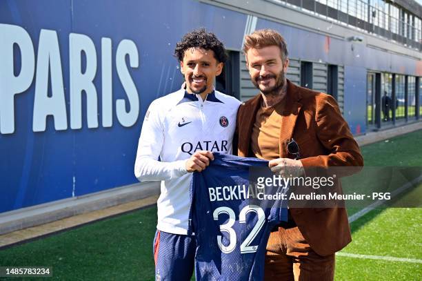 Marquinhos and David Beckham pose after a Paris Saint-Germain training session on April 27, 2023 in Paris, France.