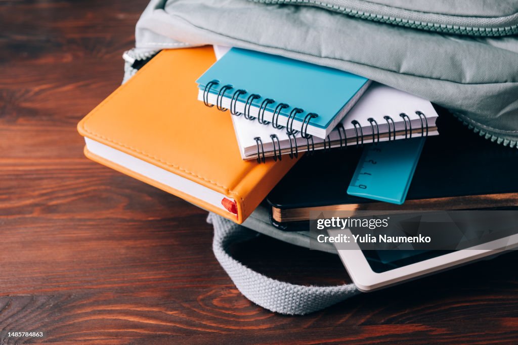 School supplies on a wooden table. Back to school.