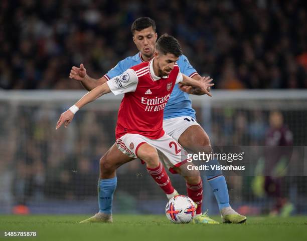 Rodri of Manchester City and Jorginho of Arsenal in action during the Premier League match between Manchester City and Arsenal FC at Etihad Stadium...