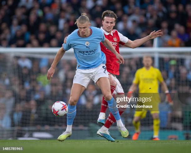 Erling Haaland of Manchester City and Rob Holding of Arsenal in action during the Premier League match between Manchester City and Arsenal FC at...