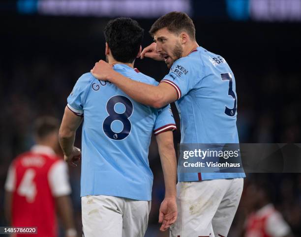 Ilkay Gundogan and Ruben Dias of Manchester City during the Premier League match between Manchester City and Arsenal FC at Etihad Stadium on April...