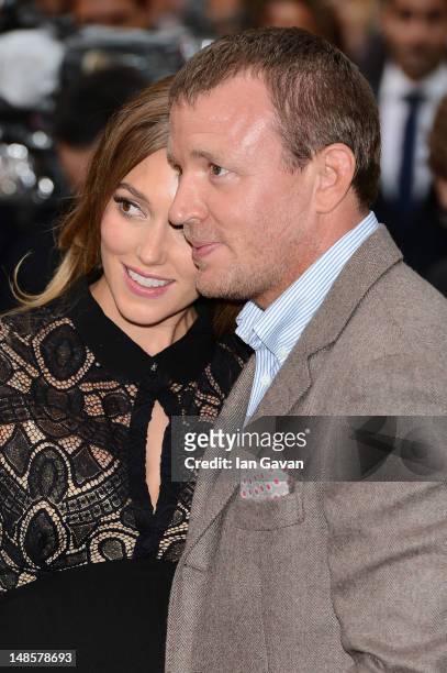 Filmmaker Guy Richie andJacqui Ainsley attend the European premiere of "The Dark Knight Rises" at Odeon Leicester Square on July 18, 2012 in London,...