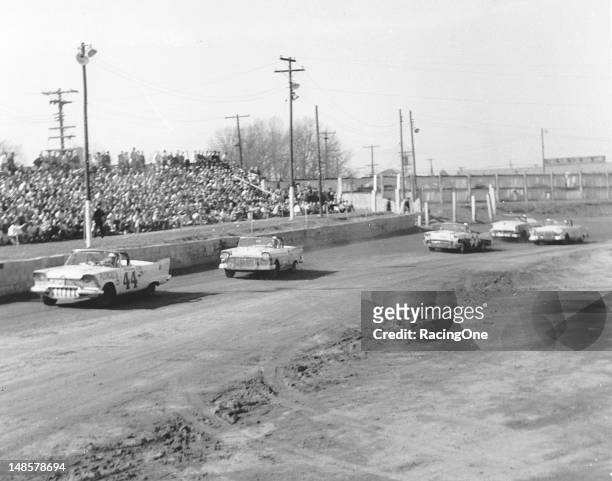 March 17, 1957: Al Tasnady in a Plymouth leads the Ford of Curtis Turner and the Chevrolet of Lewis “Possum” Jones during the NASCAR Convertible...