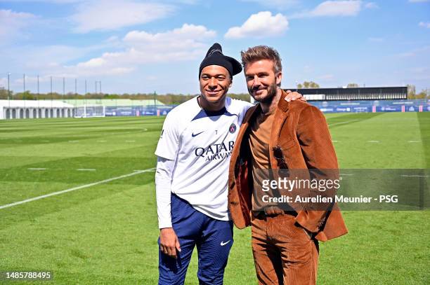 Kylian Mbappe and David Beckham pose after a Paris Saint-Germain training session on April 27, 2023 in Paris, France.