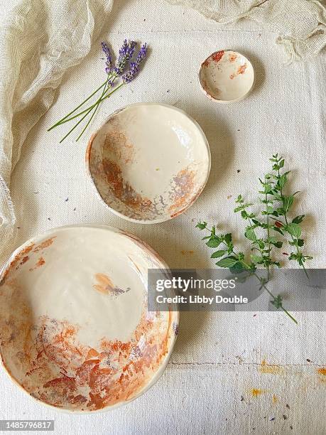 cream and terracotta bowls on table top flat lay - boho stock pictures, royalty-free photos & images