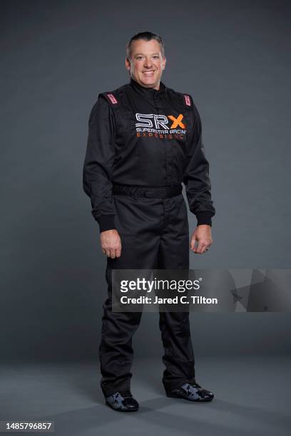 Driver Tony Stewart poses for a photo during the Superstar Racing Experience portrait shoot at Clutch Studios on April 25, 2023 in Huntersville,...