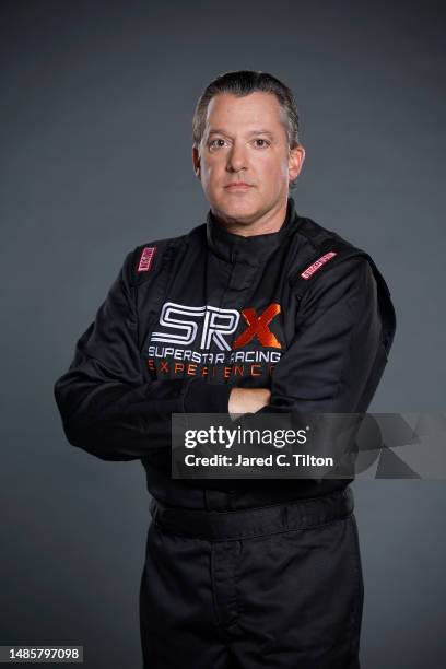 Driver Tony Stewart poses for a photo during the Superstar Racing Experience portrait shoot at Clutch Studios on April 25, 2023 in Huntersville,...