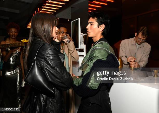 Emily Ratajkowski and Evan Mock attend Hennessy X.O x Kim Jones 'X.O Lab' pop-up in NYC on April 26, 2023 in New York City.