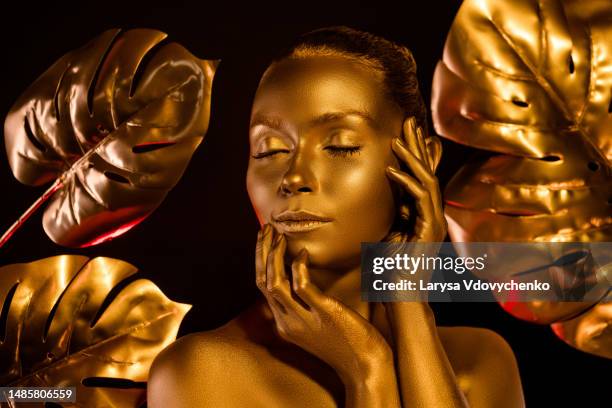 112 Gold Body Paint Portrait Stock Photos, High-Res Pictures, and