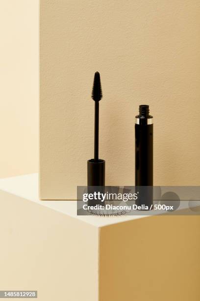 close-up of bottles on table,romania - wimperntusche stock-fotos und bilder