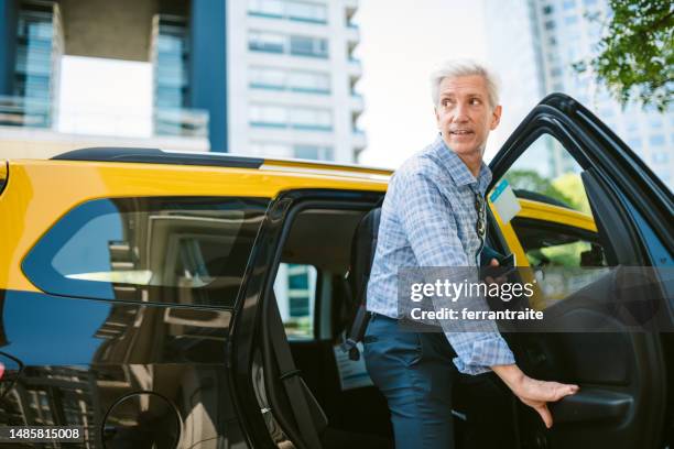 businessman taxi ride - uber in buenos aires argentina stock pictures, royalty-free photos & images