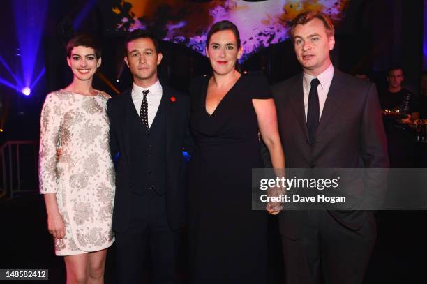 Anne Hathaway, Joeseph Gordon Levitt and Christopher Nolan attend the European premiere afterparty of The Dark Knight Rises at Freemasons Hall on...