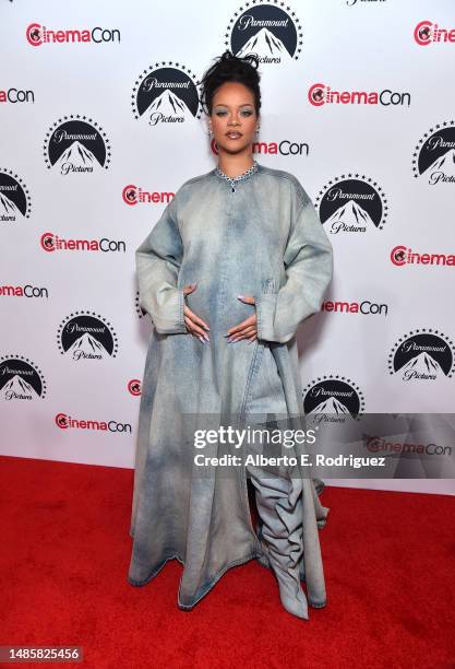 Rihanna poses for photos, promoting the upcoming Smurfs film, at the Paramount Pictures presentation during CinemaCon 2023, the official convention...
