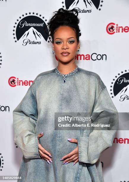 Rihanna poses for photos, promoting the upcoming film "The Smurfs Movie", at the Paramount Pictures presentation during CinemaCon 2023, the official...