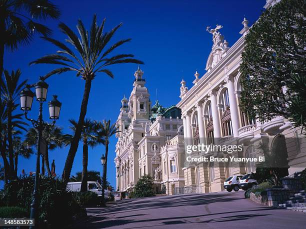 place du casino and surrounding gardens. - monaco cars stock pictures, royalty-free photos & images