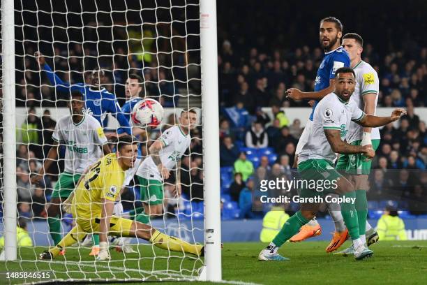 Dwight McNeil of Everton scores the team's first goal direct from a corner kick during the Premier League match between Everton FC and Newcastle...