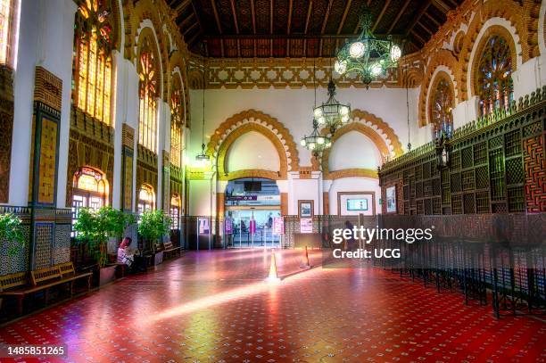 Wide angle view of the waiting room inside the old transportation building. Antique architecture of the Toledo AVE station.
