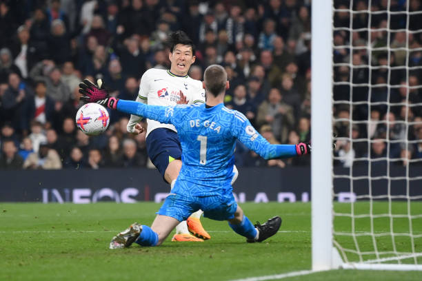 Son Heung-Min of Tottenham Hotspur scores the team's second goal past David De Gea of Manchester United during the Premier League match between...