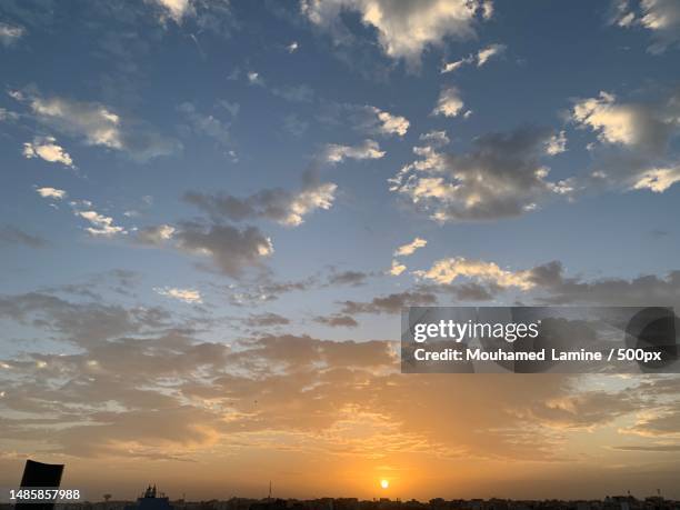 silhouette buildings against sky during sunset,dakar,senegal - senegal landscape stock pictures, royalty-free photos & images