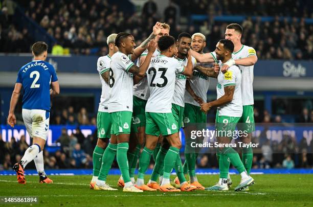 Jacob Murphy of Newcastle United celebrates with teammate Alexander Isak after Jacob scores the fourth goal during the Premier League match between...