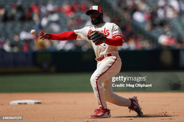 Luis Rengifo of the Los Angeles Angels throws to first base for an out in the fifth inning against the Oakland Athletics at Angel Stadium of Anaheim...