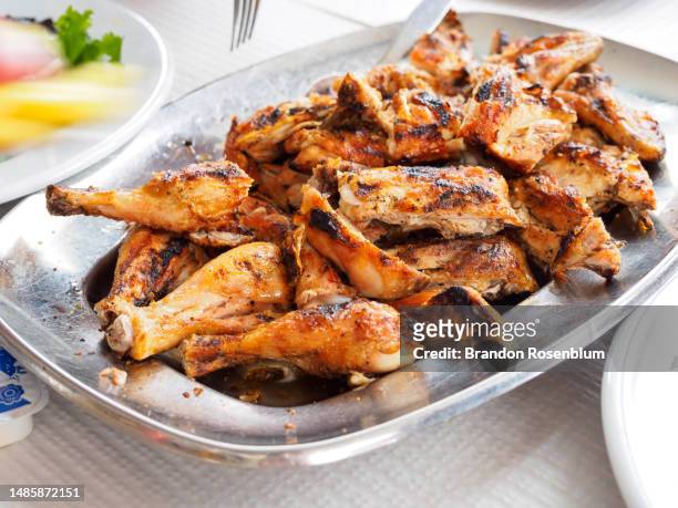 piri piri chicken in the algarve region of southern portugal - chicken meat stock pictures, royalty-free photos & images