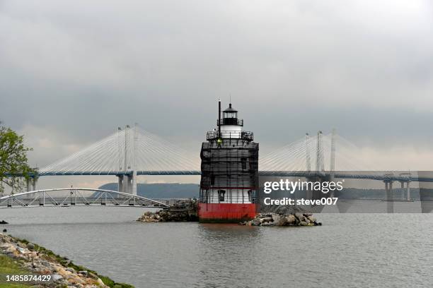 restoration of the tarrytown lighthouse also know as the sleepy hollow lighthouse. - tarrytown stock pictures, royalty-free photos & images